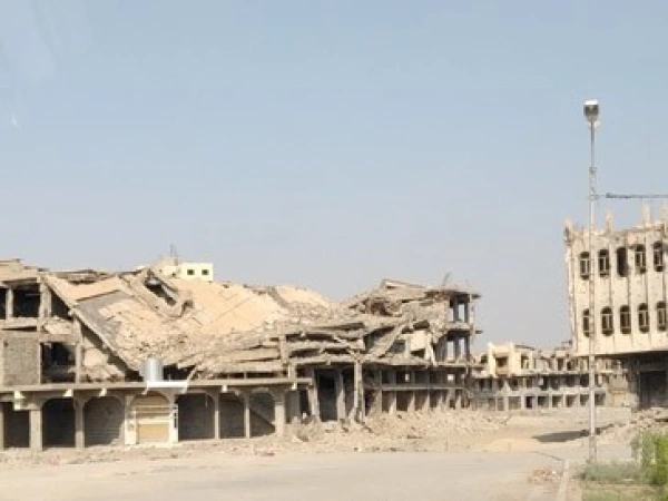 Von den Machtzentren zu den Ohnmachtsorten. Banner zum Irak