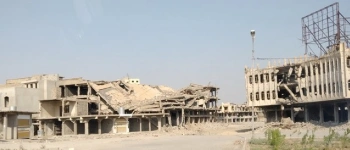 Von den Machtzentren zu den Ohnmachtsorten. Banner zum Irak