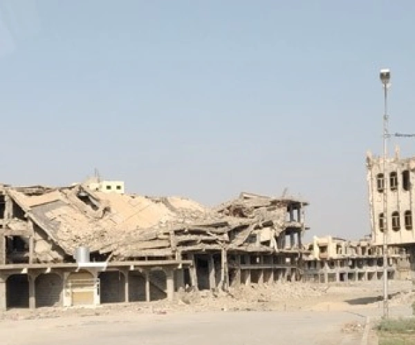 Von den Machtzentren zu den Ohnmachtsorten. Banner zum Irak